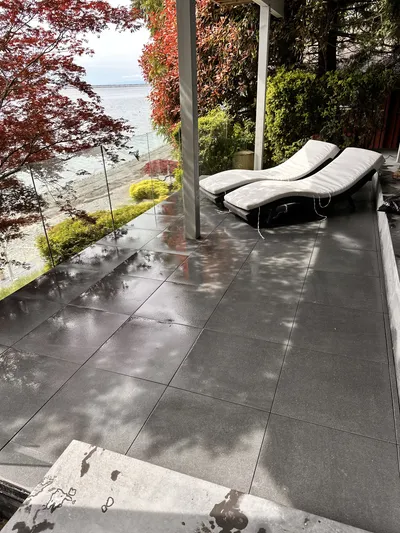 Lower deck level with glass railing and composite decking, Kelowna BC