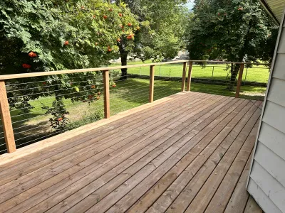 Stainless steel railing on pressure-treated deck, Okanagan
