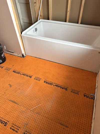 Floor membrane and underlayment during bathroom reno, Kelowna