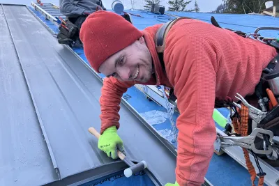 Liam on-site during metal roof install