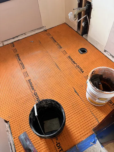 Subfloor preparation during bathroom renovation, Kelowna BC