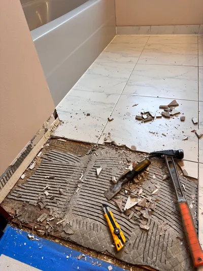 Bathroom floor before renovation, Kelowna BC